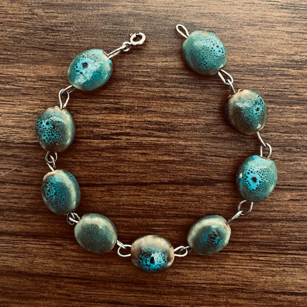Teal and green ceramic bead bracelet with silver plated clasp